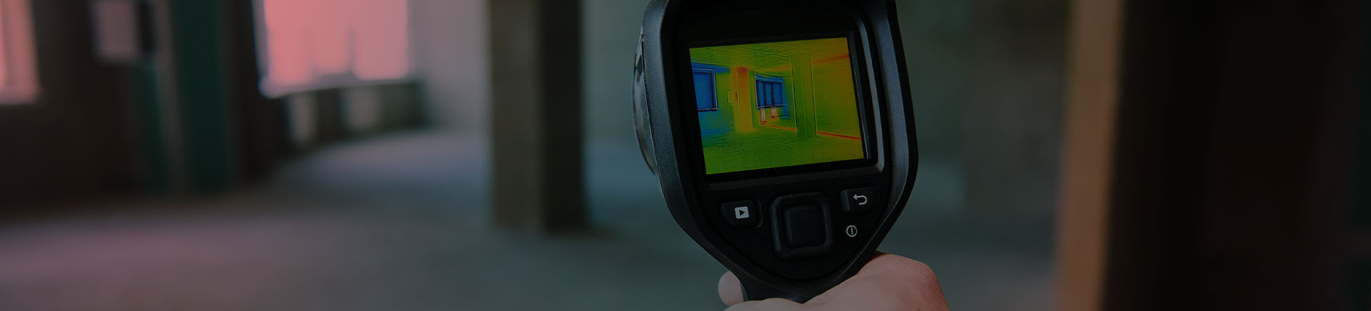 close up of a hvac contractor holding an infrared camera in front of a room naples fl