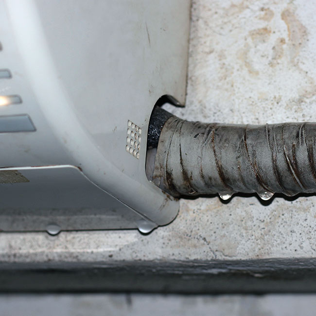 close up of damaged hvac with leaking refrigerant naples fl